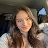 An example creator (a generated face, not a real person)
